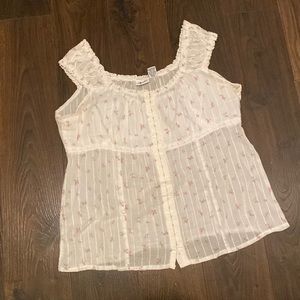 White top with small pink flowers